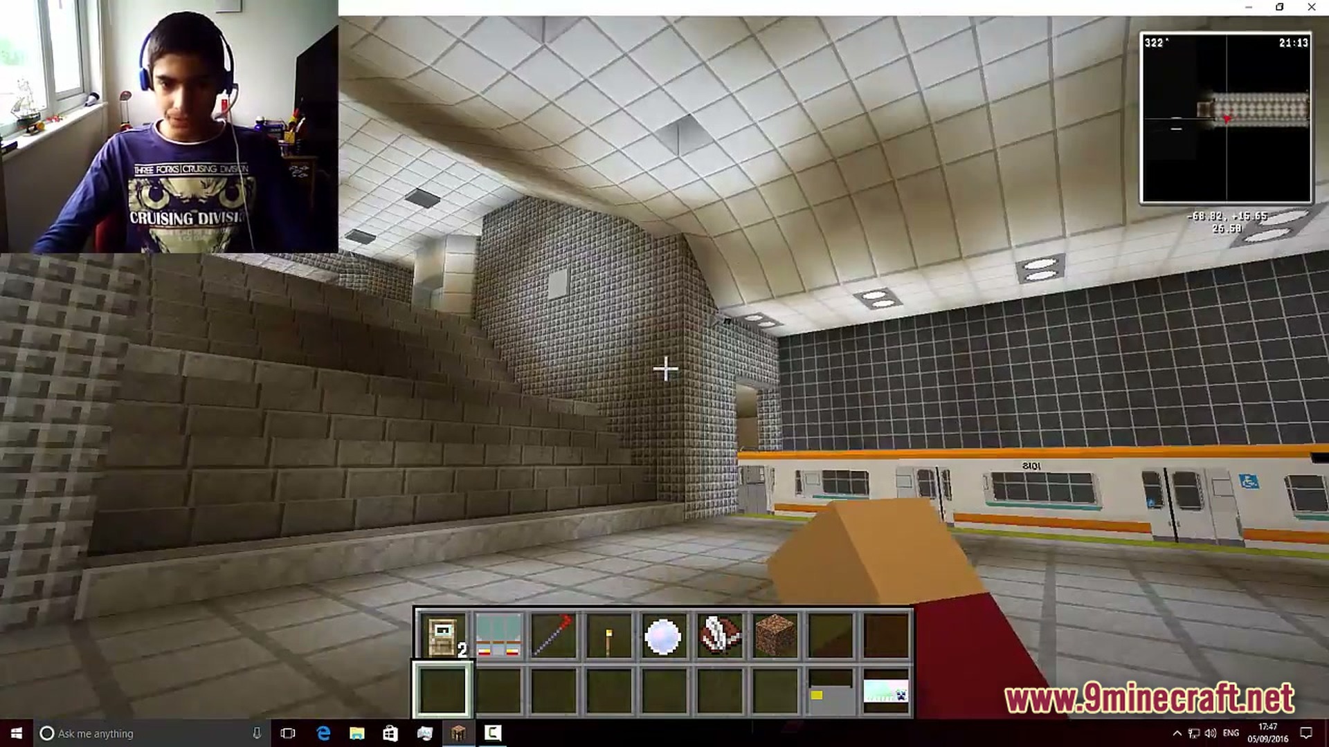 Lithic Progression Modpack Screenshot 4 A first-person view of a modern subway station interior featuring a train and tiled walls