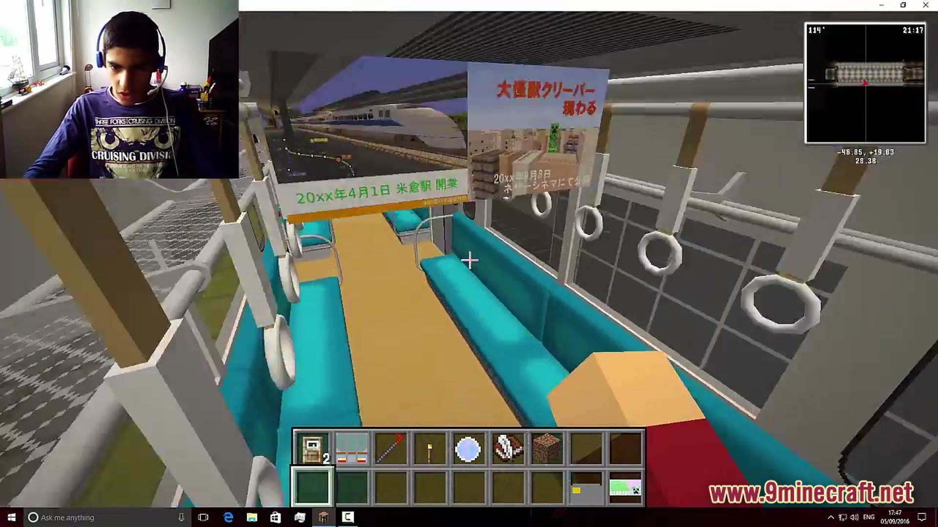 Lithic Progression Modpack Screenshot 6 A player explores the interior of a modern Japanese-style train car with blue seating and advertisements