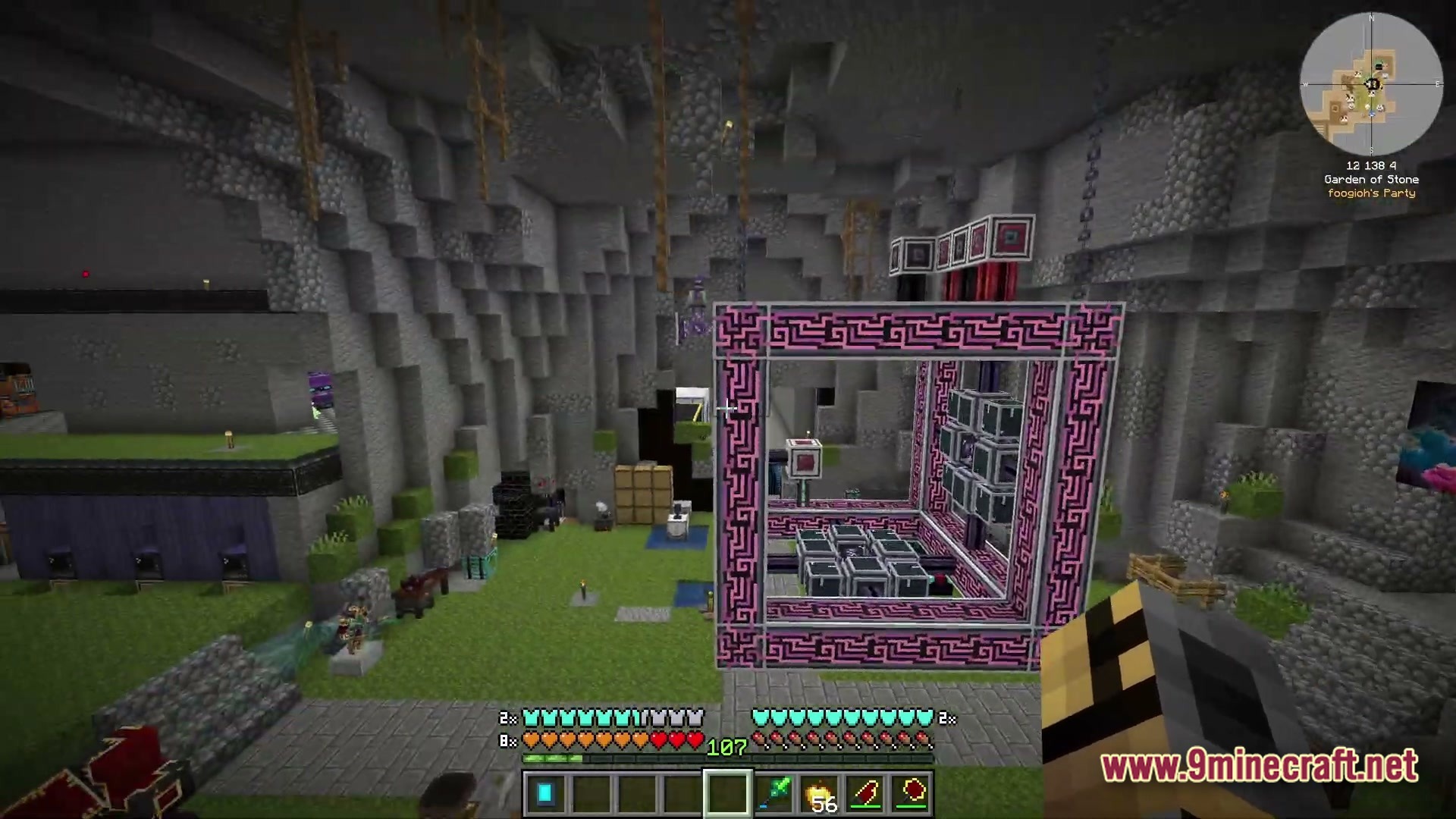 Lithic Vault Trials Modpack Screenshot 2 A large pink and black mechanical structure stands within a stone cavern base with various machines