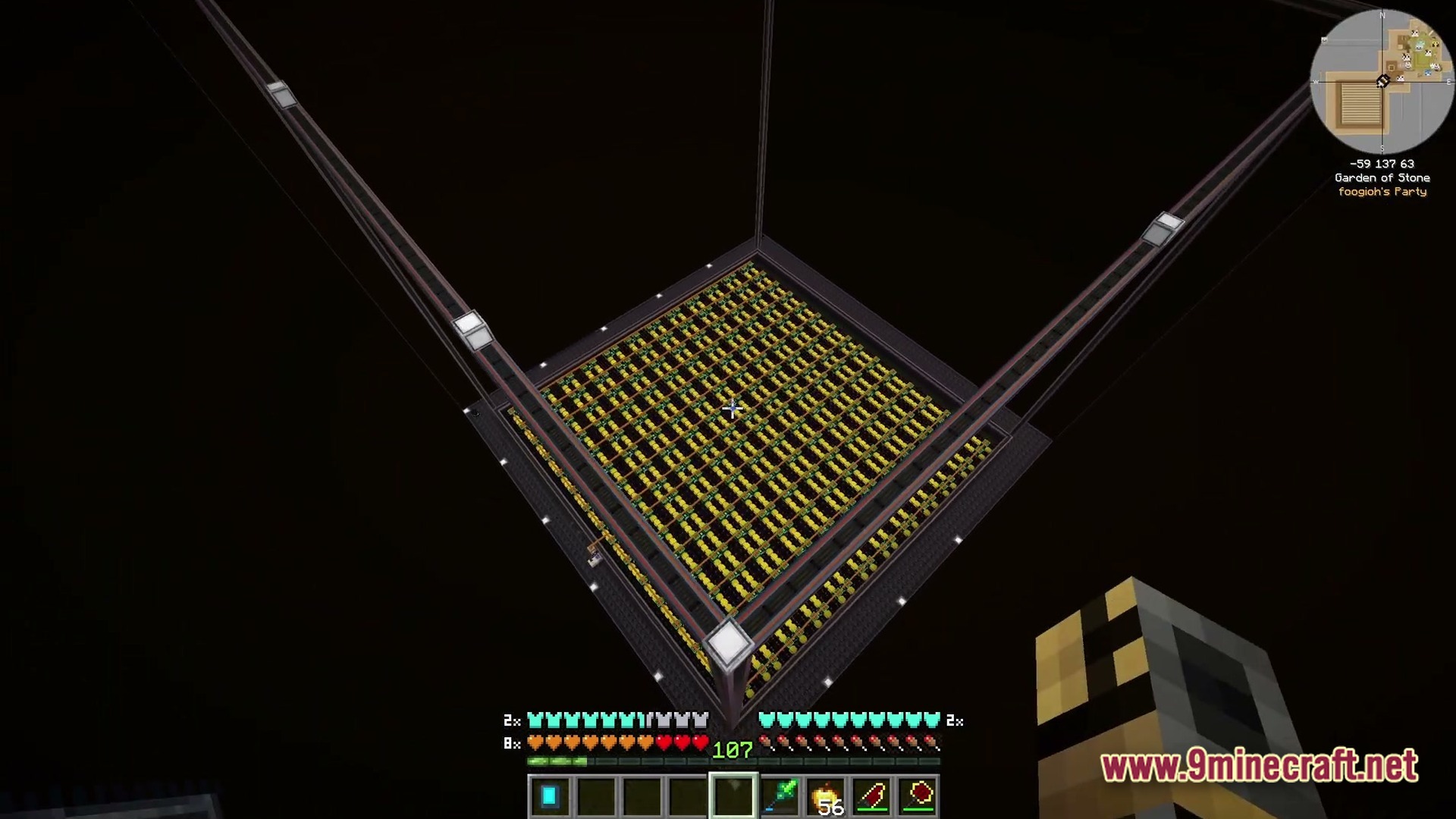 Lithic Vault Trials Modpack Screenshot 3 An overhead view of a large automated farm structure containing rows of yellow crops