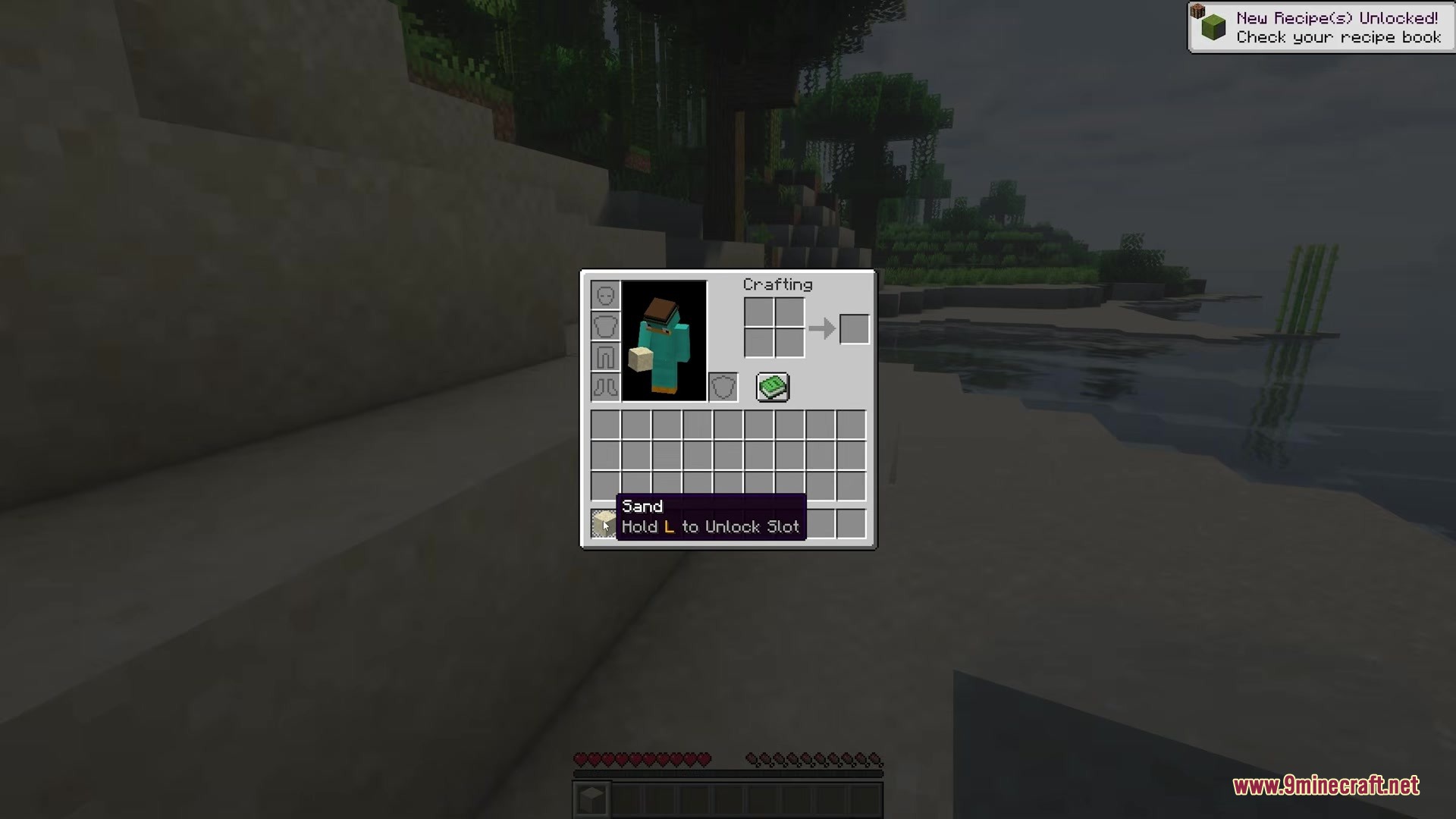 A sand block is secured in the player inventory using a locked slot