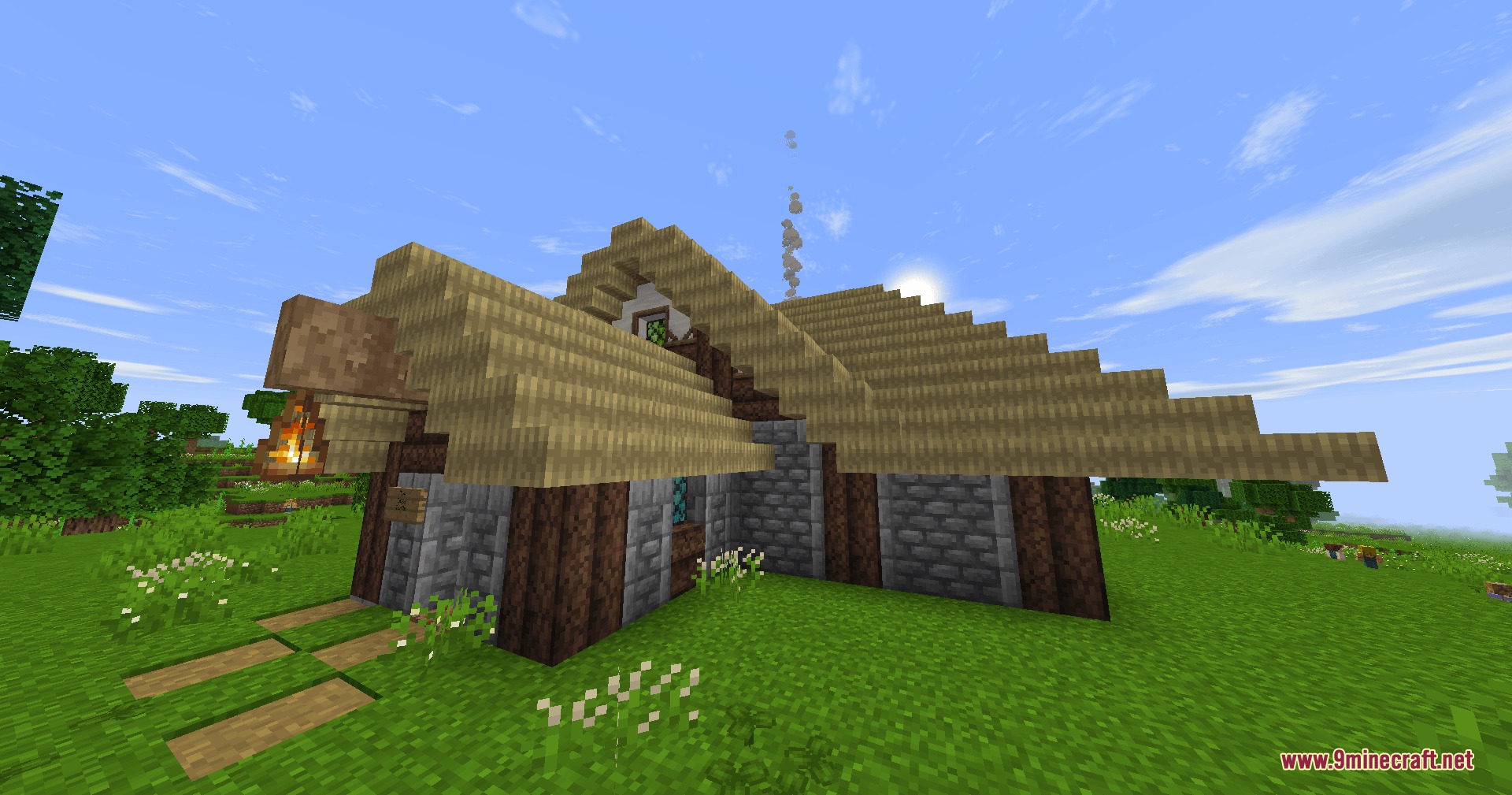 Lord of the Rings Renewed Extended Mod Screenshot 6 A rustic cottage with stone walls and a lantern hanging outside
