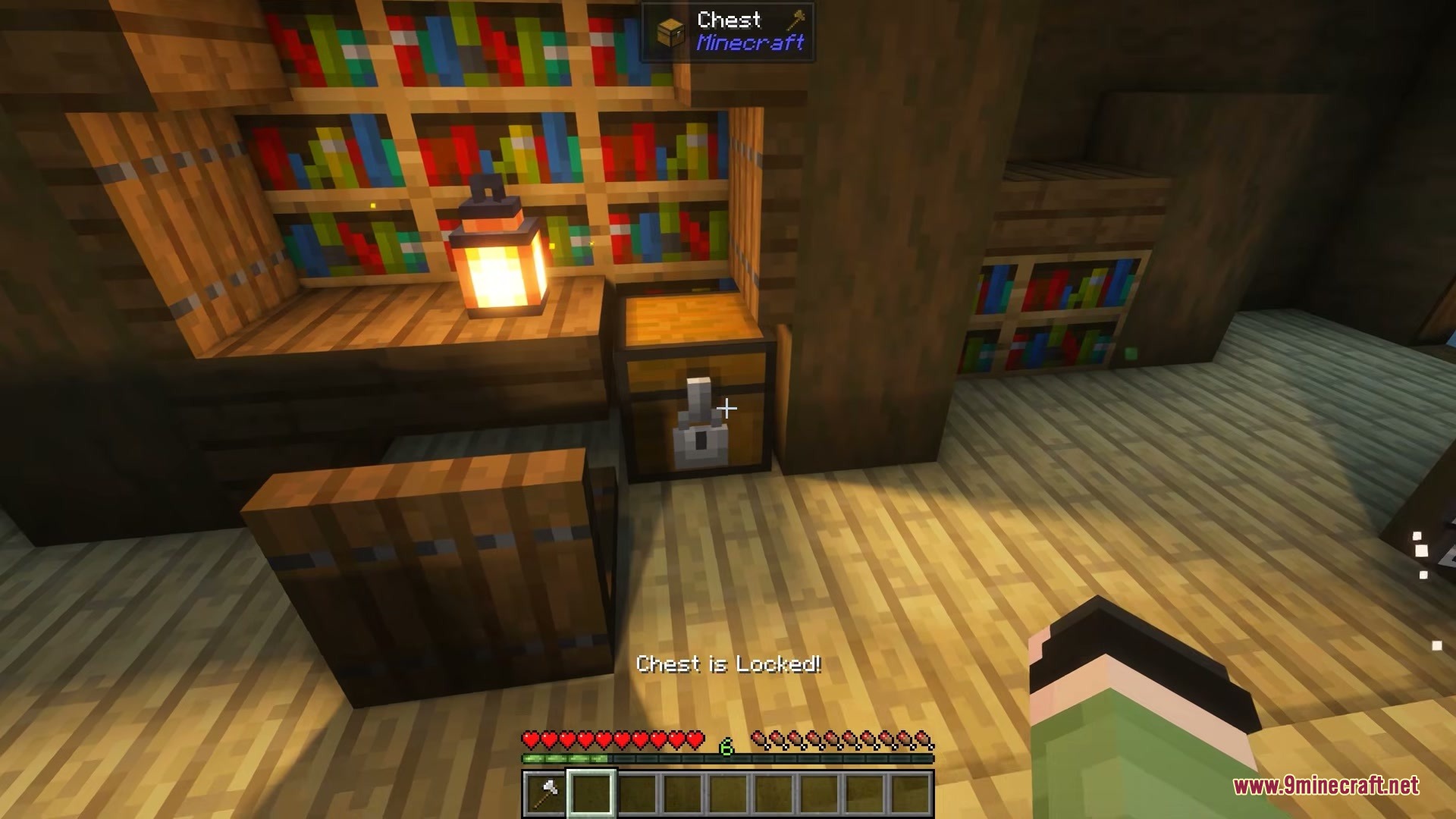 Lucky's Locksmith Mod Screenshot 3 A player encounters a locked chest while exploring a wooden library interior