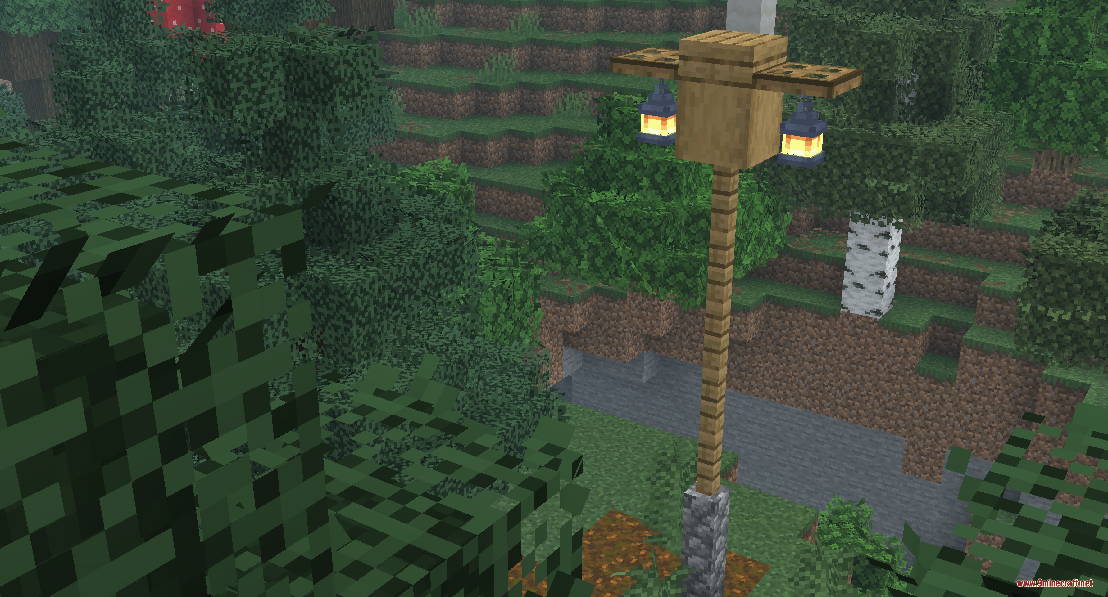 A wooden street lamp featuring two detailed lanterns in a lush forest biome