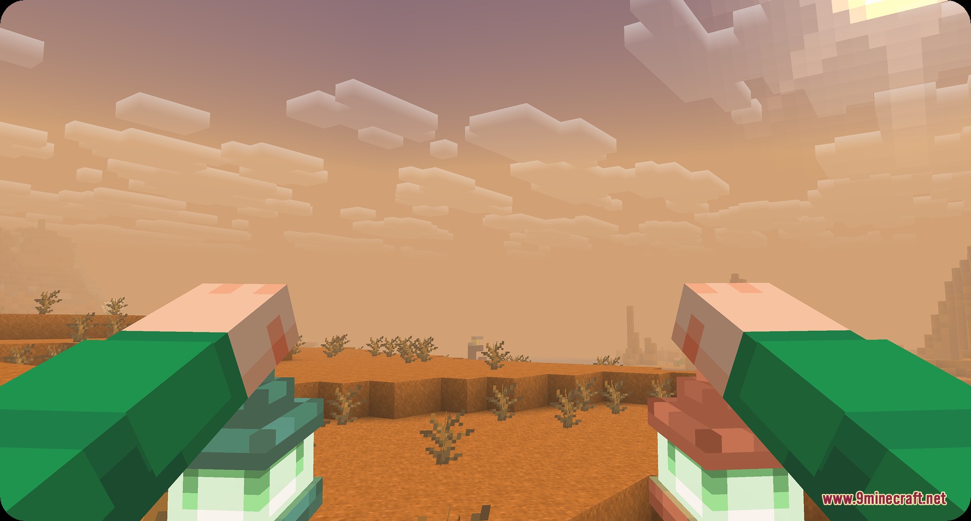 Player holding two detailed 3D lanterns in a desert biome during sunset