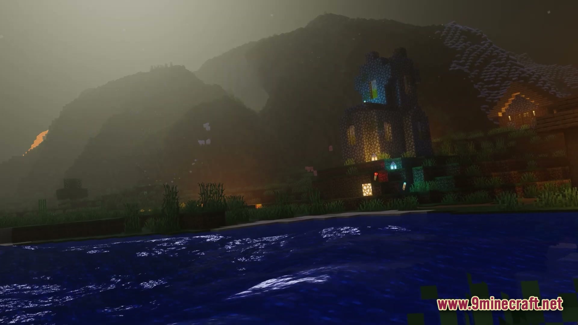 Luminous Prism Overhaul Modpack Screenshot 1 A cobblestone tower and house sit beside a river under a foggy, mountainous night sky