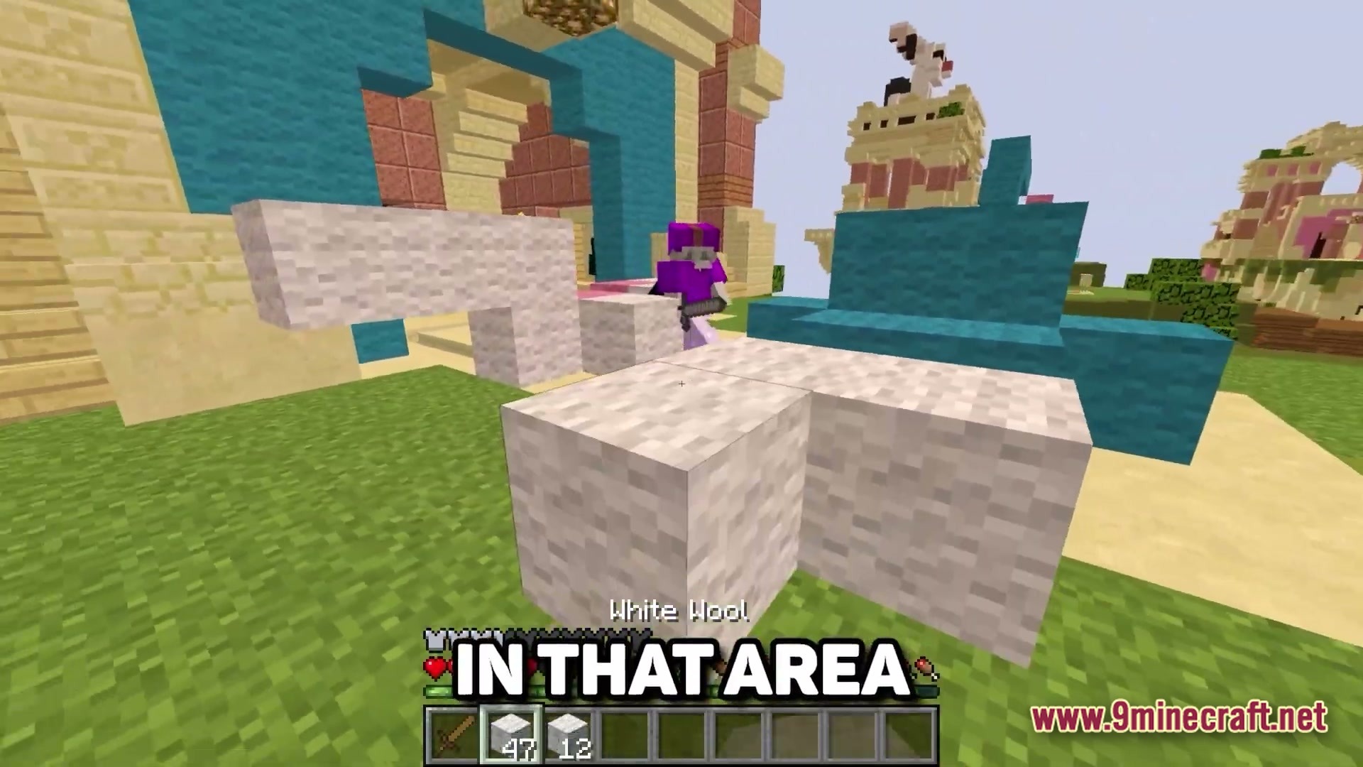 Lunar Celestial Zenith Modpack Screenshot 5 A player in purple armor places white wool blocks near colorful structures in a grassy field