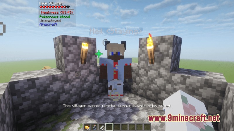 A werewolf villager stands in a cobblestone pen while being cured
