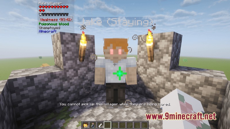 A vampire villager with glowing red eyes is being cured between torches