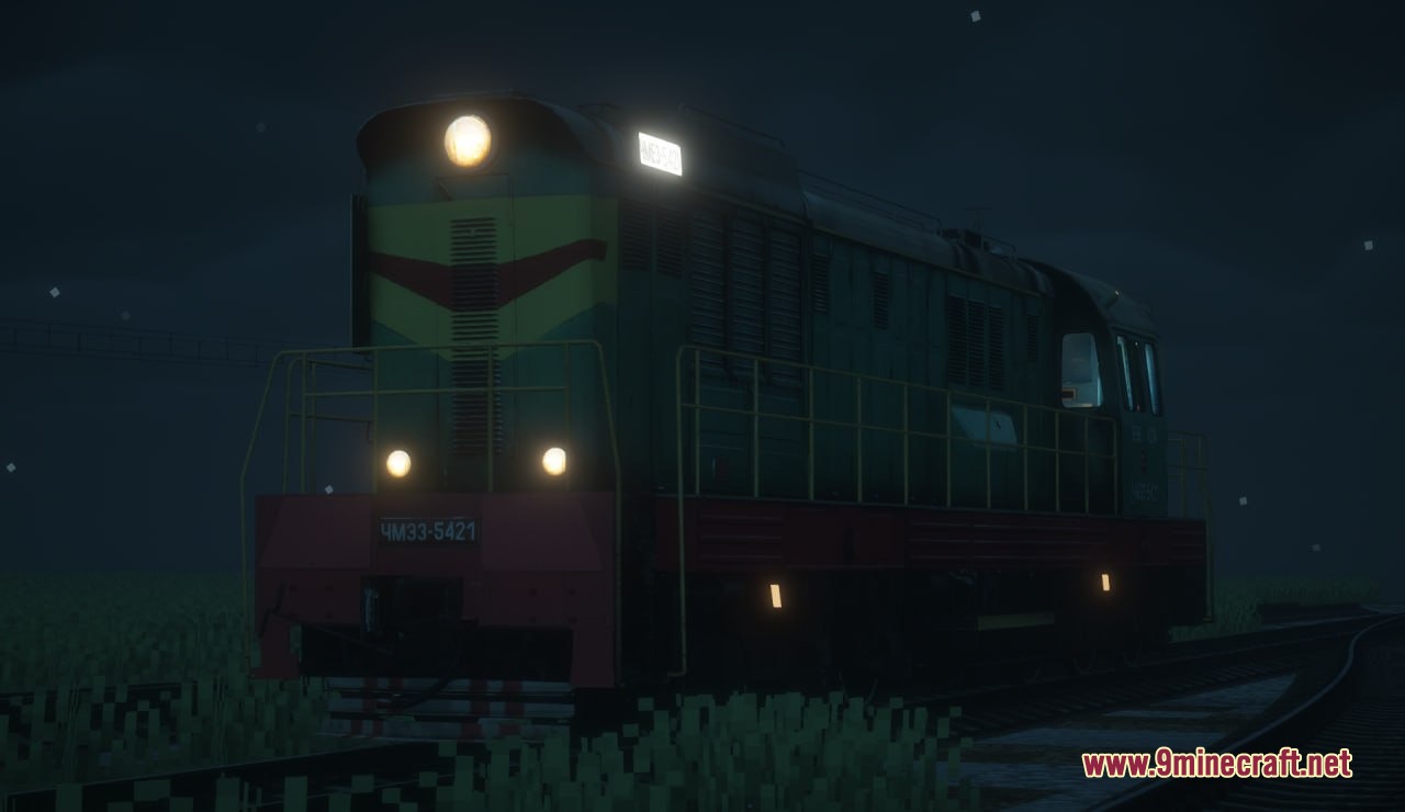 MTR NTE International Train Pack Resource Pack Screenshot 6 Green diesel locomotive with glowing headlights on a railway track at night
