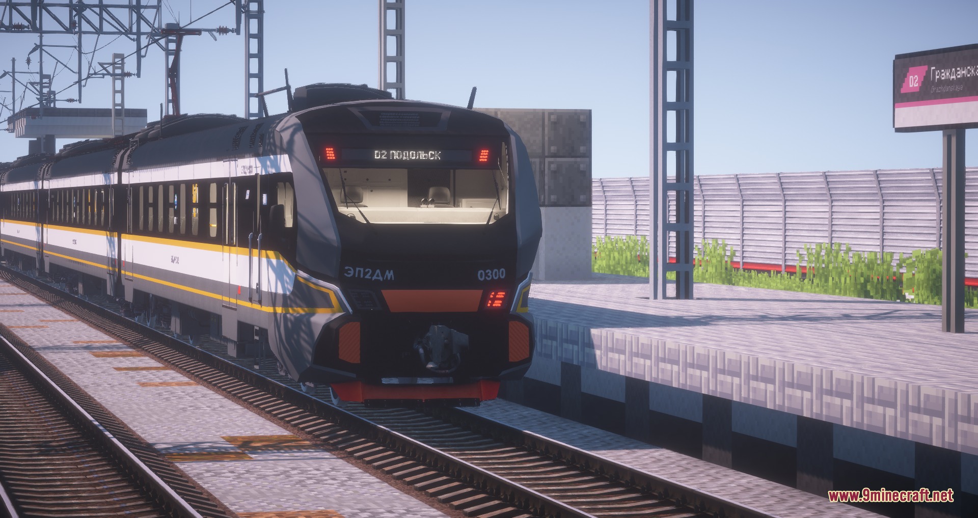 MTR NTE International Train Pack Resource Pack Screenshot 8 A modern black train arriving at a detailed Minecraft railway station
