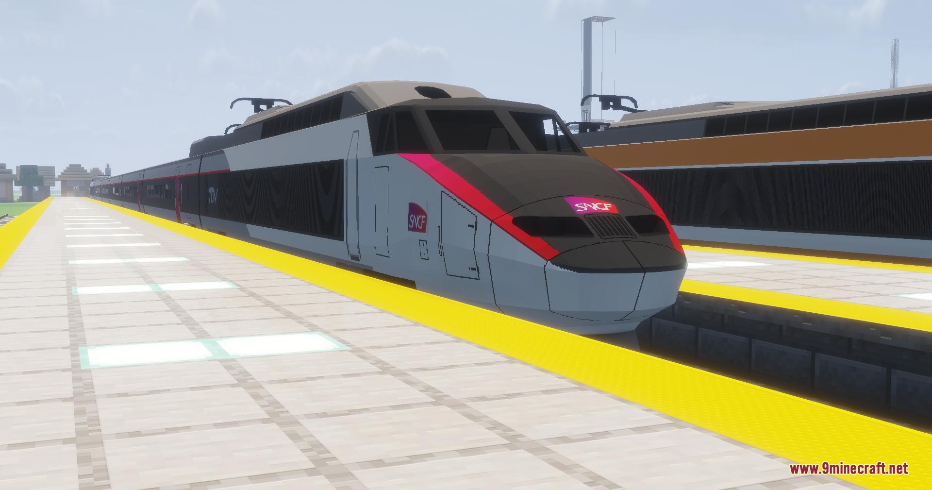 Modern grey and red Carmillon livery TGV train on a Minecraft railway track