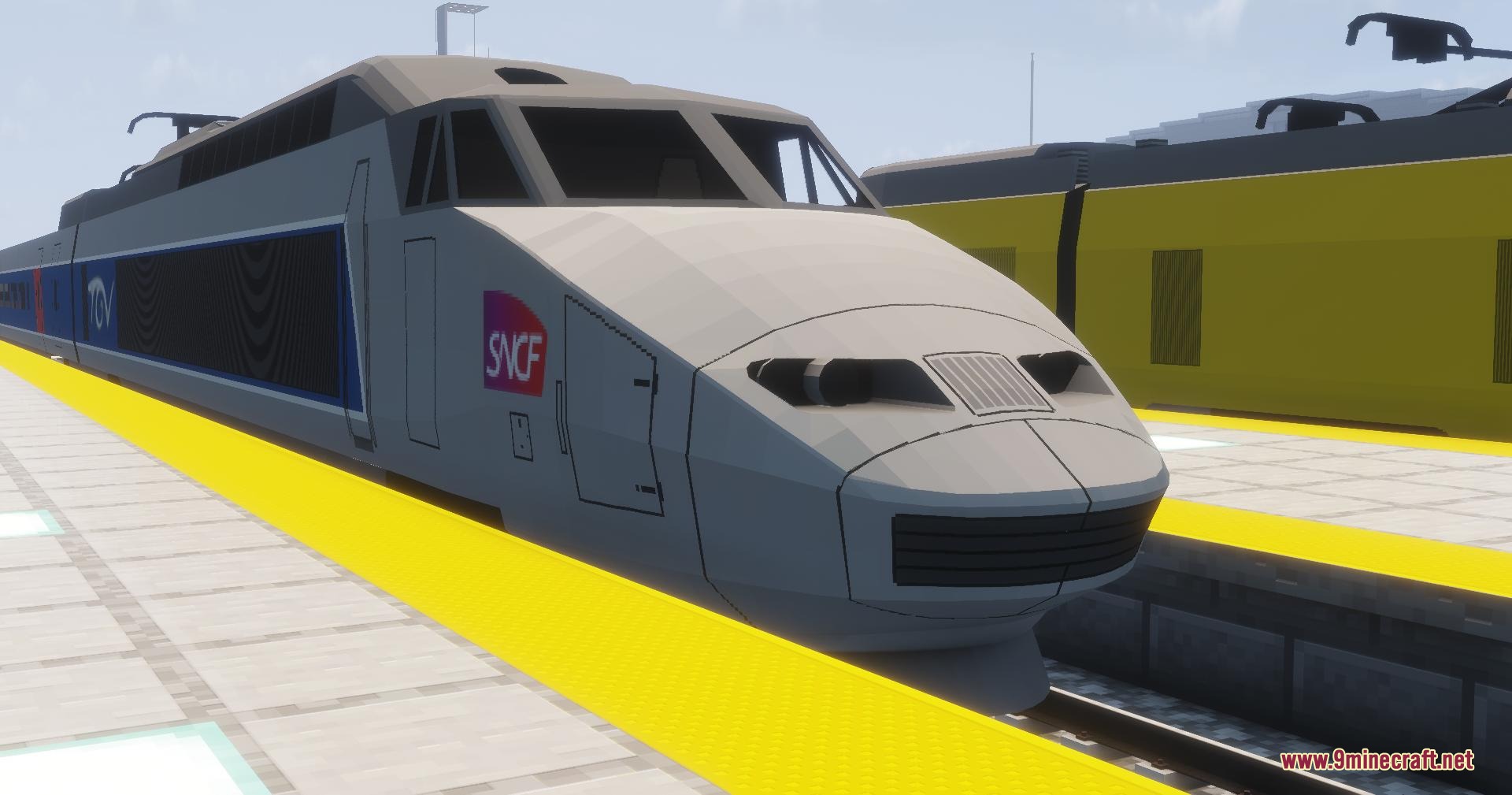 MTR TGV PSE train model with SNCF logo at a station platform