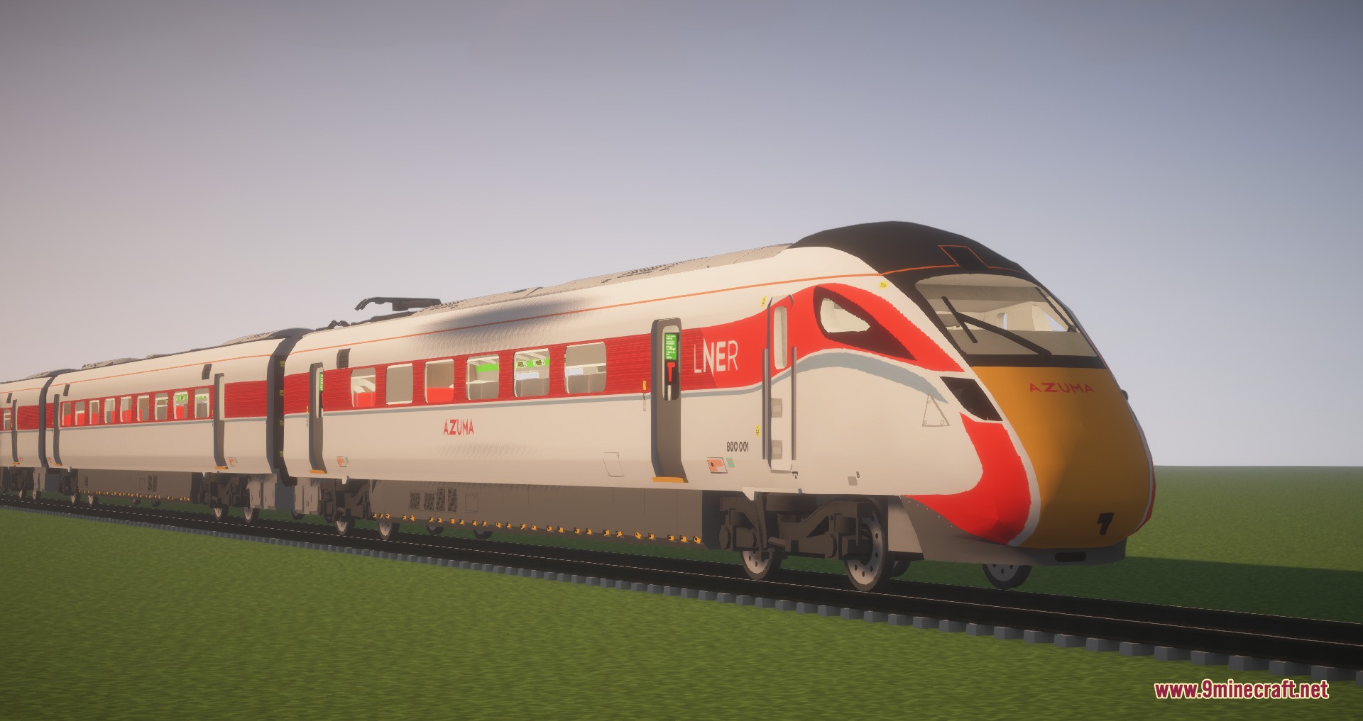 A white and red LNER Azuma train on a single railway track