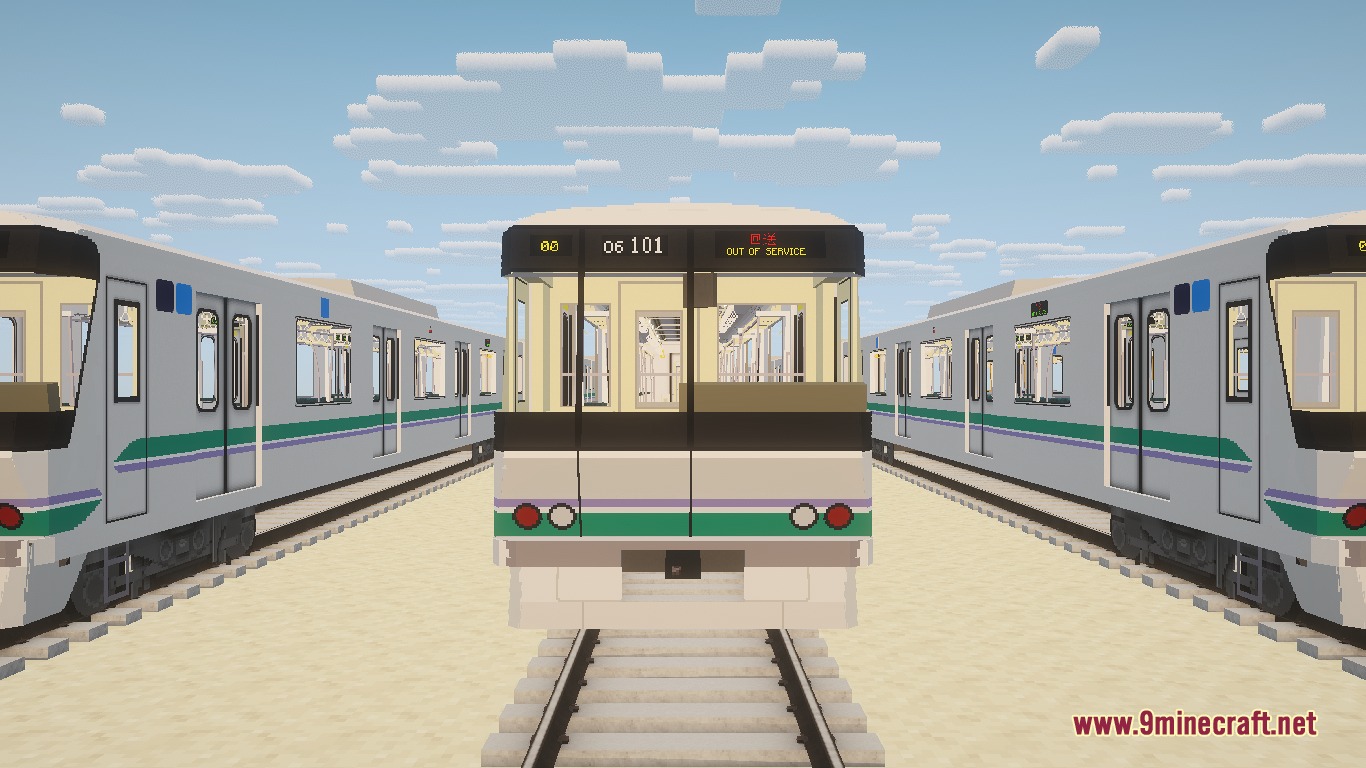 Front view of three Tokyo Metro trains parked on parallel railway tracks