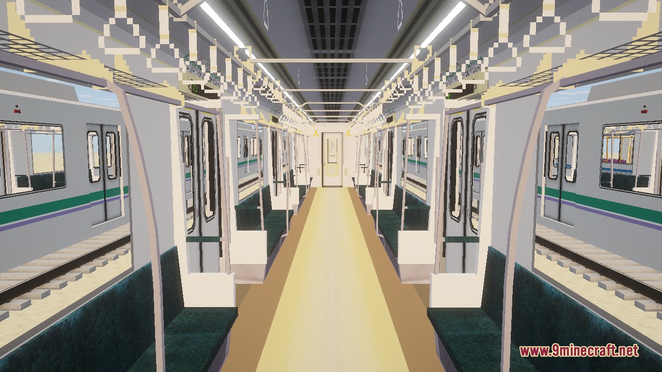 Inside a Tokyo Metro train car with green seats and hand straps