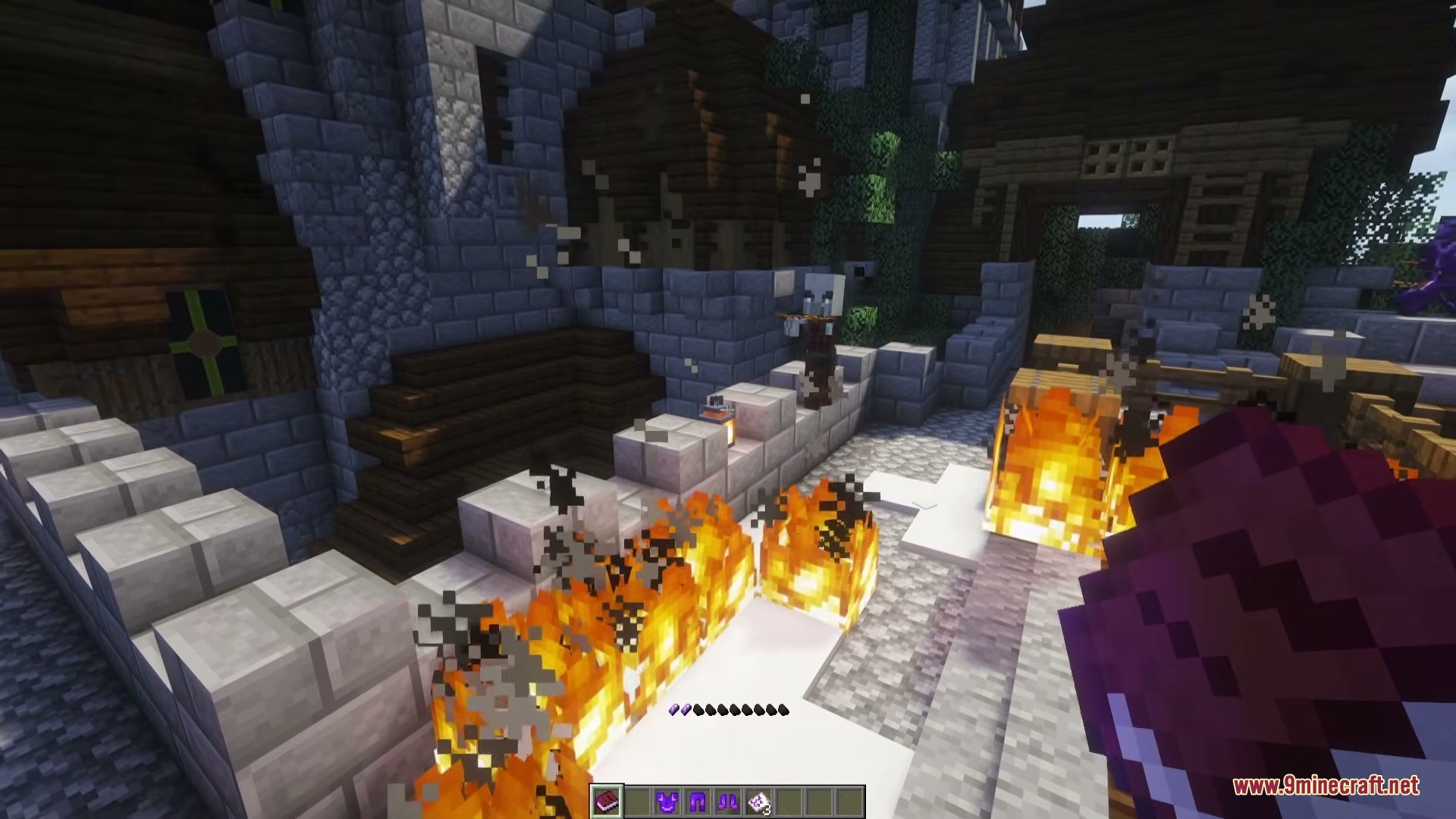 Player uses a grimoire to cast fire spells at a mage on a wall