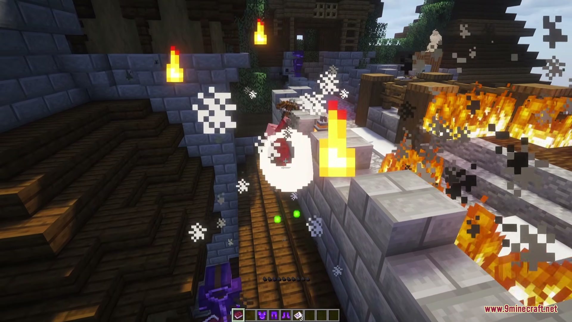 A player casts a magic spell surrounded by white particles and nearby fire