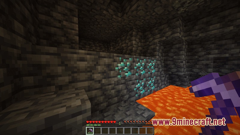 Player mining deepslate diamond ore blocks near a pool of lava