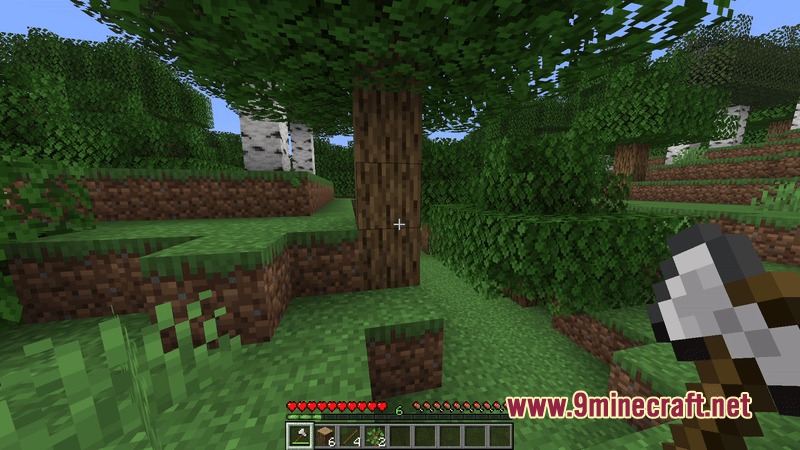 Harvesting wood with an axe using the Magnetized Loot Harvest mod