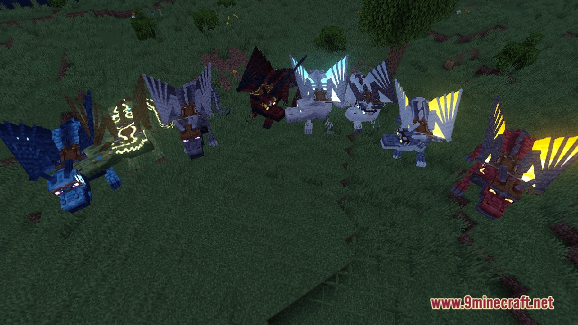 A group of colorful dragons standing together in a grassy field at night