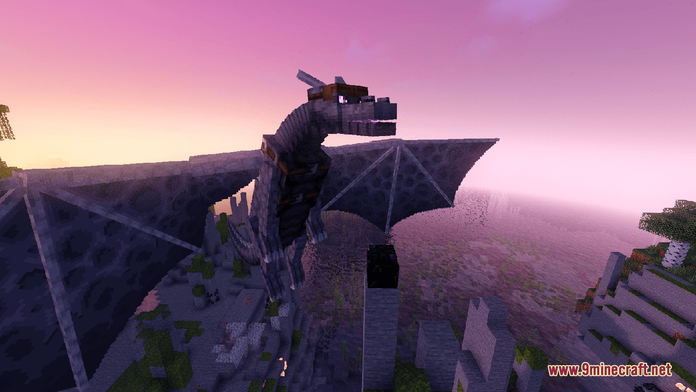 A majestic grey dragon with a saddle overlooks the landscape at sunset