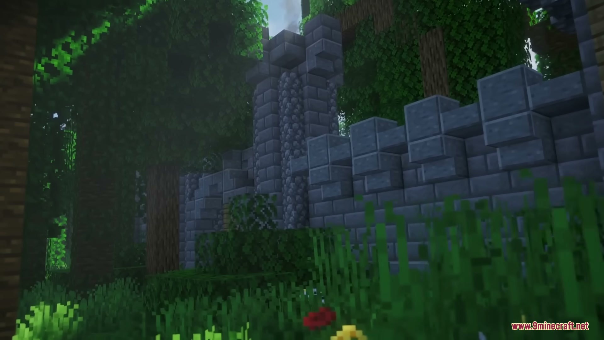 Middle Age Castles Mod Screenshot 12 Large stone castle wall hidden behind thick green trees in a forest