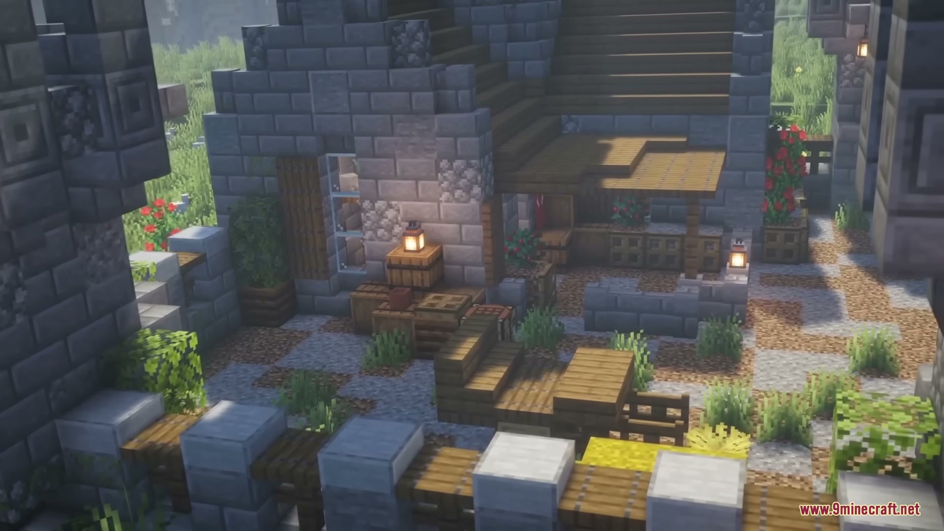 Middle Age Castles Mod Screenshot 7 A cozy medieval courtyard with stone walls and wooden furniture decorated with lanterns