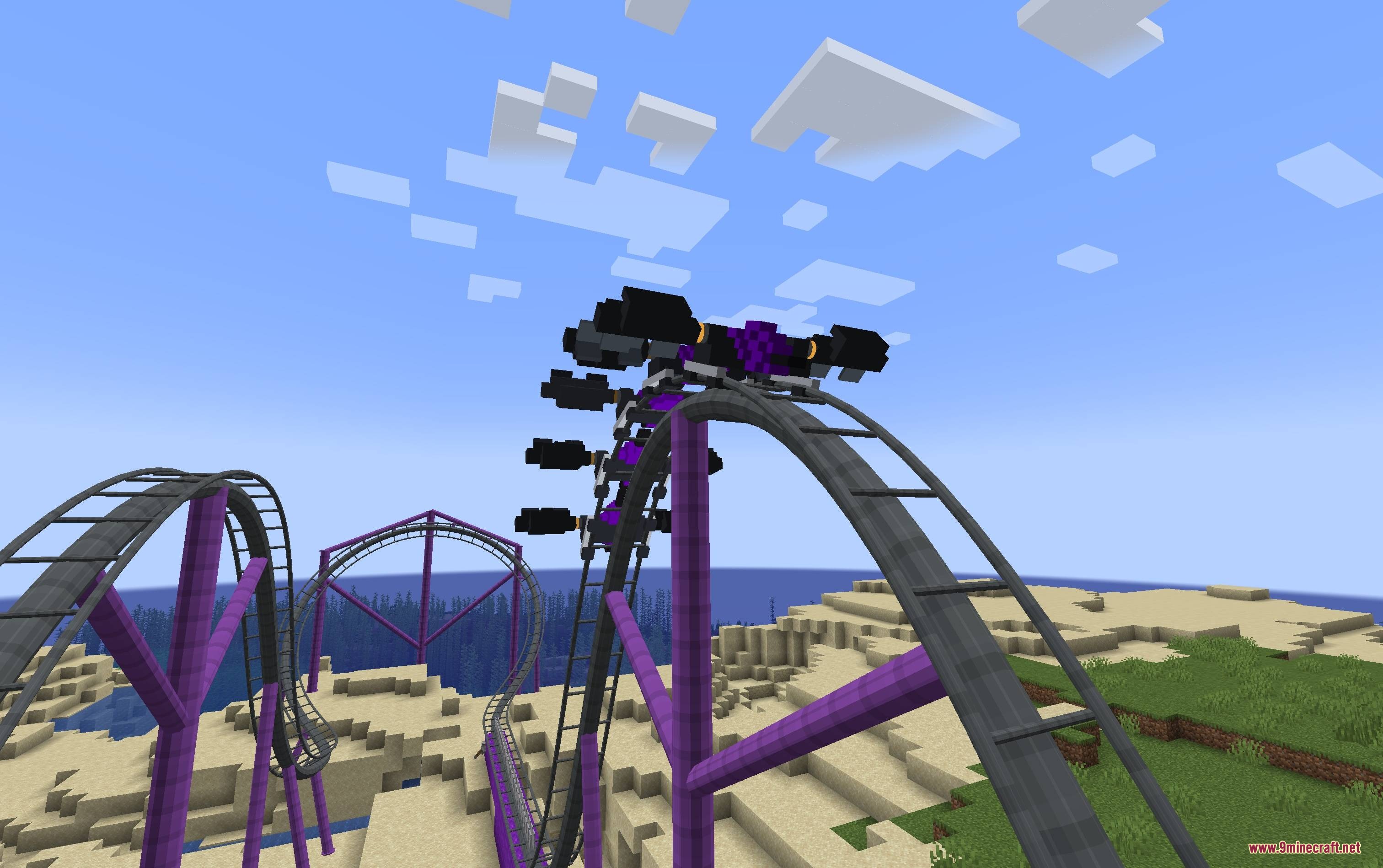 Mine Coasters Mod Screenshot 2 A purple roller coaster train crests a hill overlooking a sandy desert biome