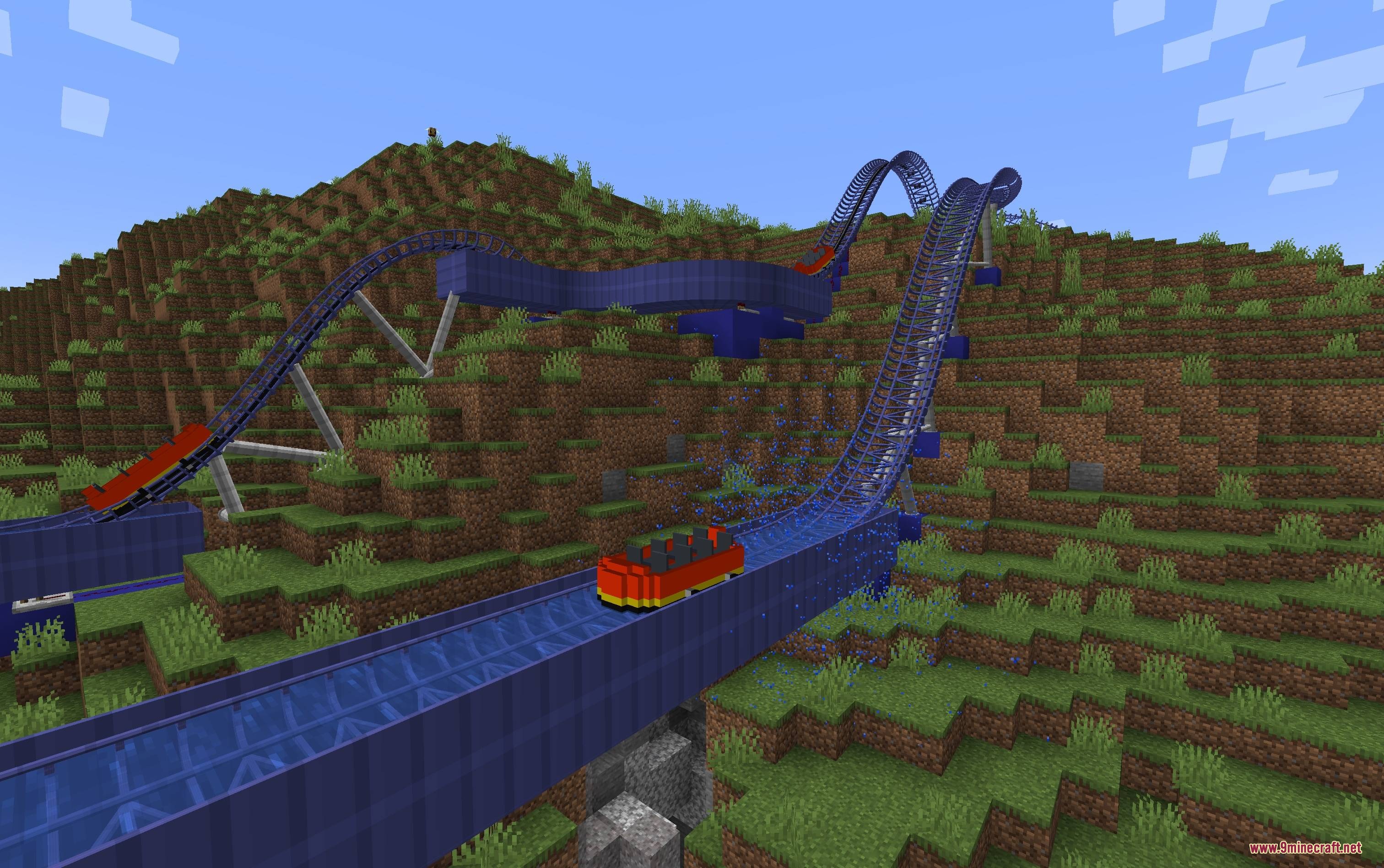 Mine Coasters Mod Screenshot 3 A red roller coaster car descends a blue track with water splashes