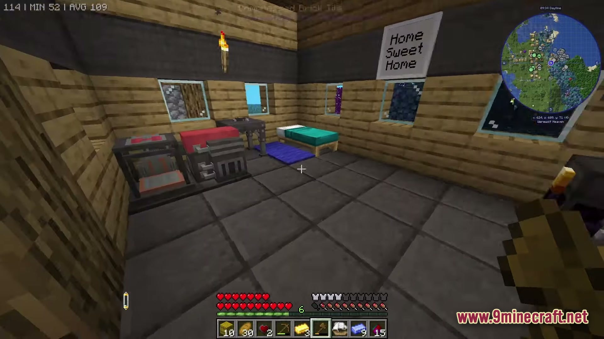 Mine Colonies Dimensional Adventure Modpack Screenshot 6 Interior of a wooden house featuring a bed, crafting stations, and a Home Sweet Home sign