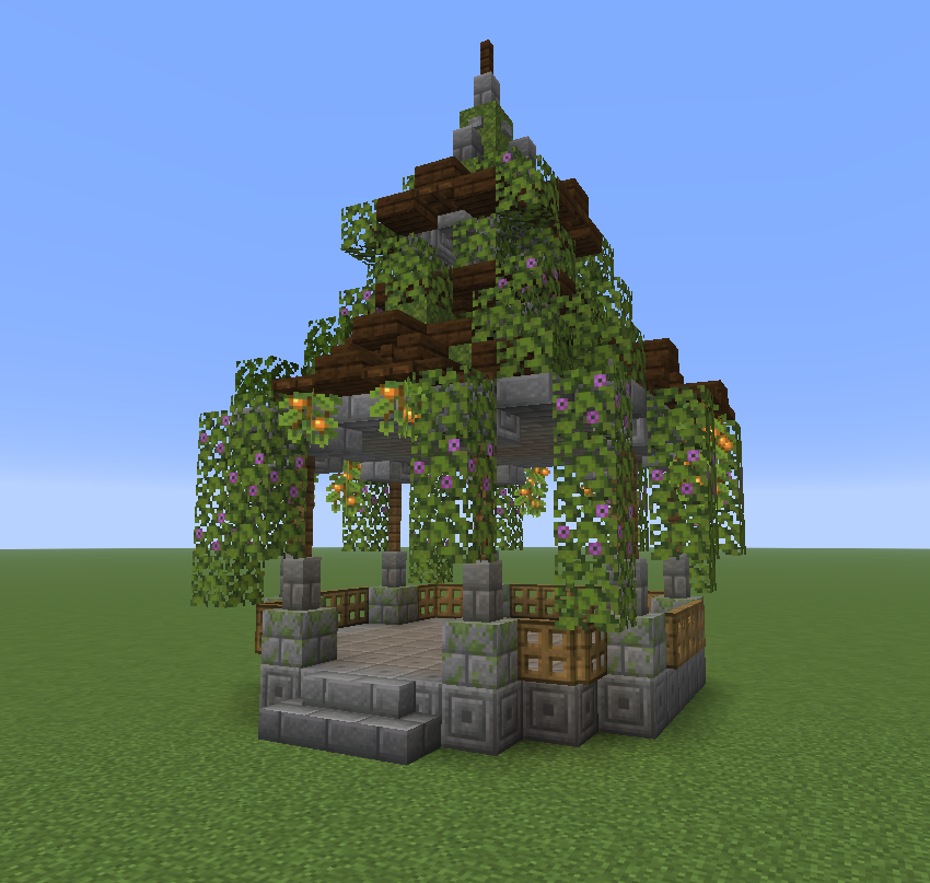 Minecraft Ganzebo Schematic Screenshots 1 A decorative stone gazebo covered in lush azalea leaves and glow berries