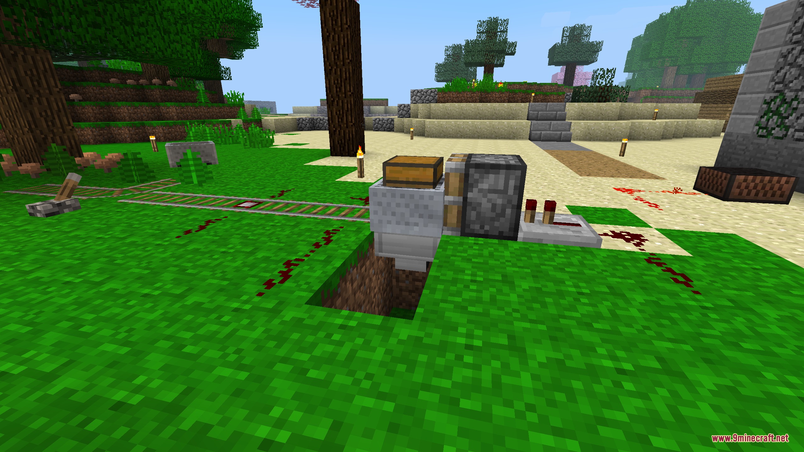 Minecraft Sigma MCS Mod Screenshot 7 A chest minecart positioned over a hopper with redstone piston components