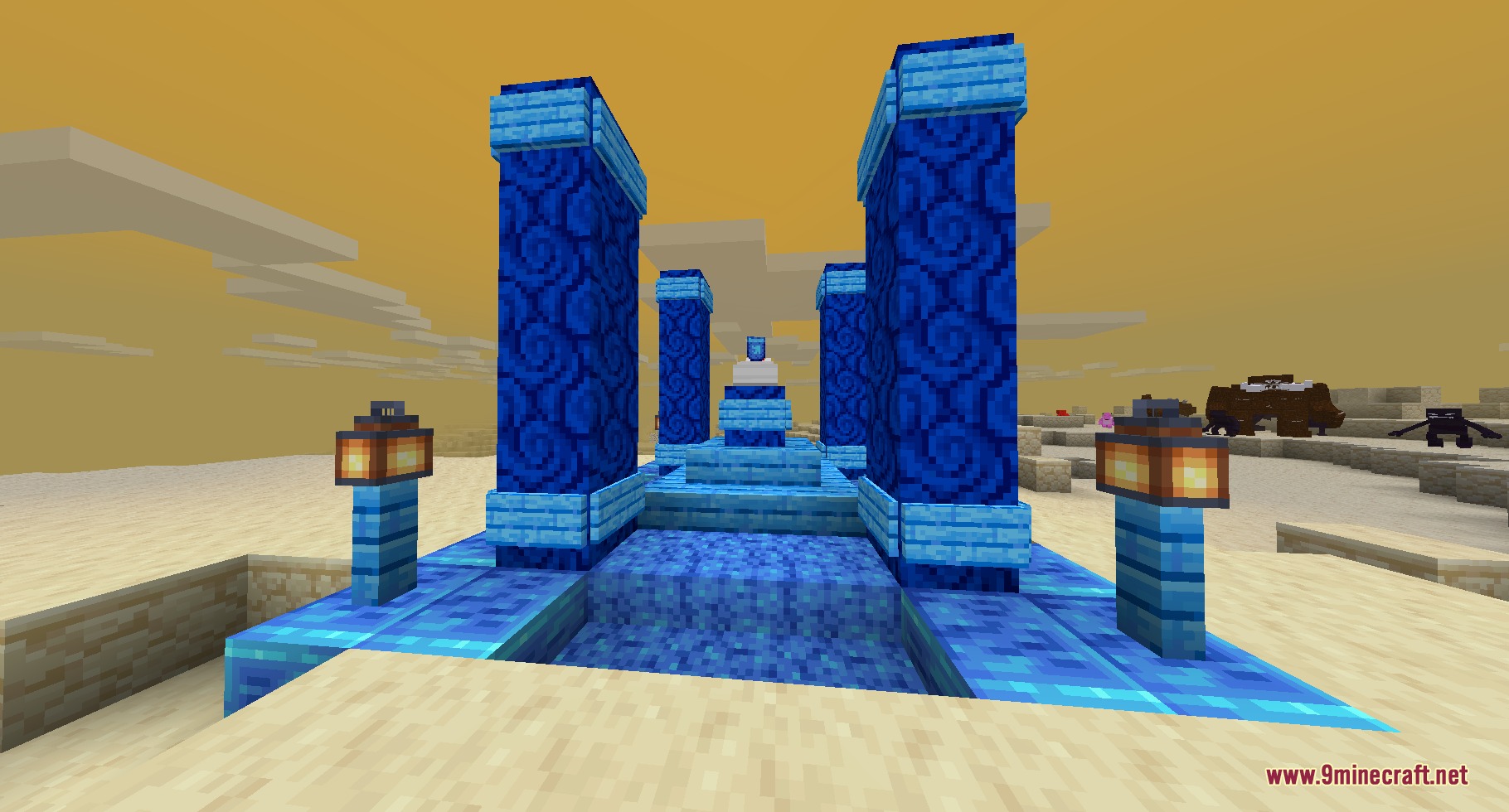 A decorative blue stone ruin structure standing in a desert biome
