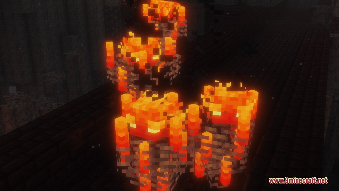 A group of Blazes floating and glowing in a dark underground area