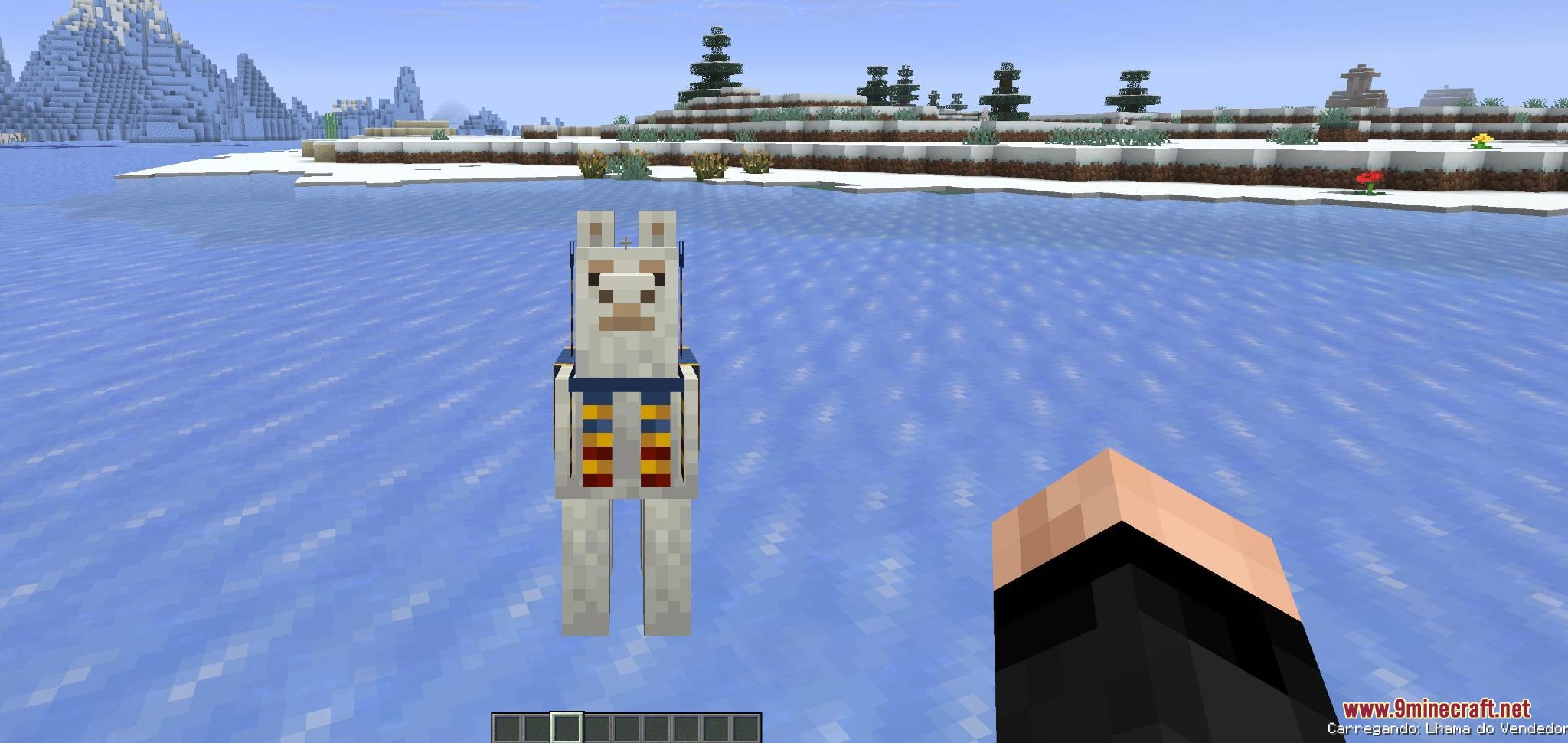 Mobs and Villager Mod Screenshot 1 Player carrying a white llama with a colorful carpet in a snowy biome