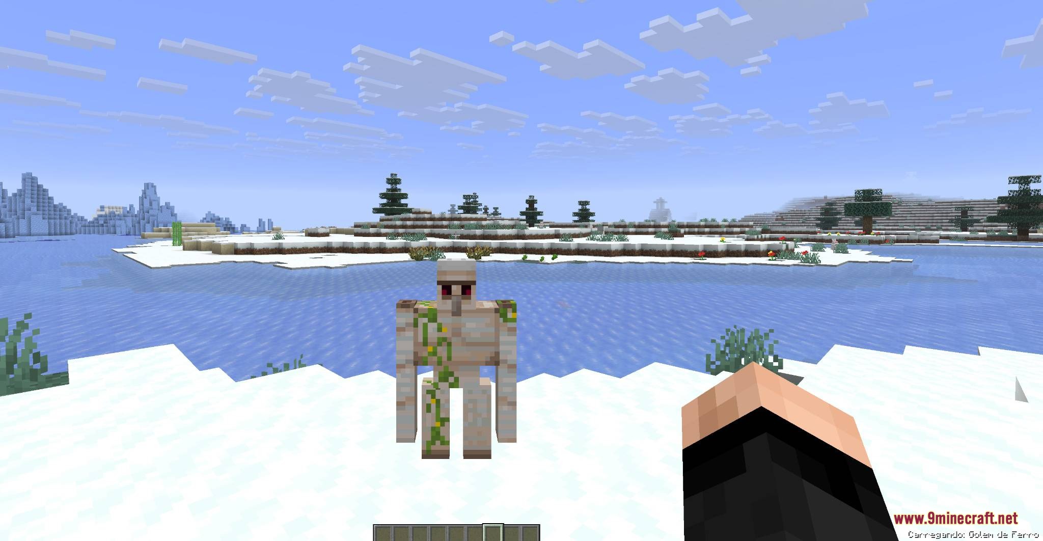 Mobs and Villager Mod Screenshot 6 A player carrying a small iron golem in their hand over the snow