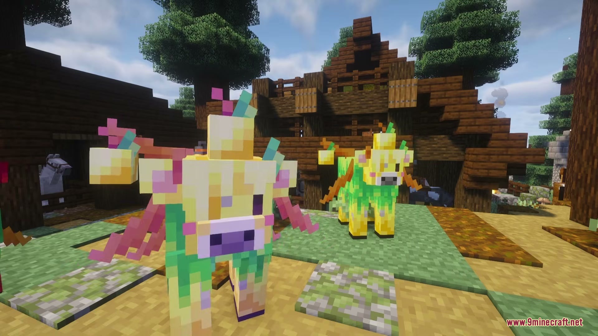 Golden apple cows with yellow fruit standing outside a wooden building