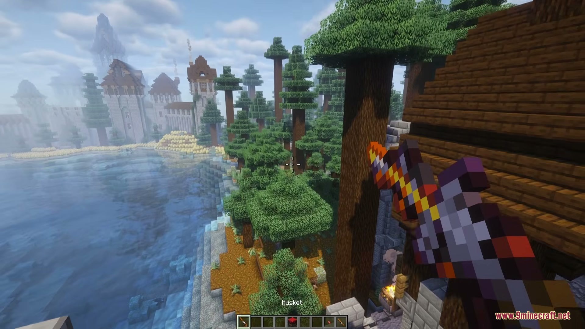Modular Muskets Mod Screenshot 5 A player holds a colorful custom musket overlooking a scenic Minecraft landscape