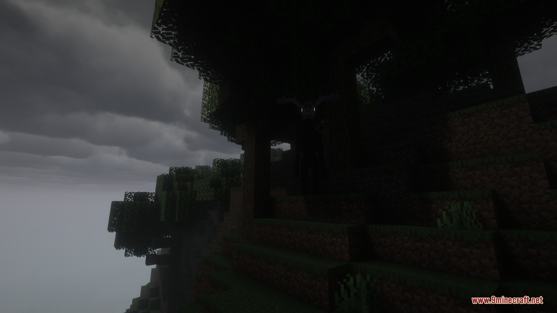 Mooseman Mod Screenshot 6 A terrifying monster watches from the shadows of a large cliffside tree