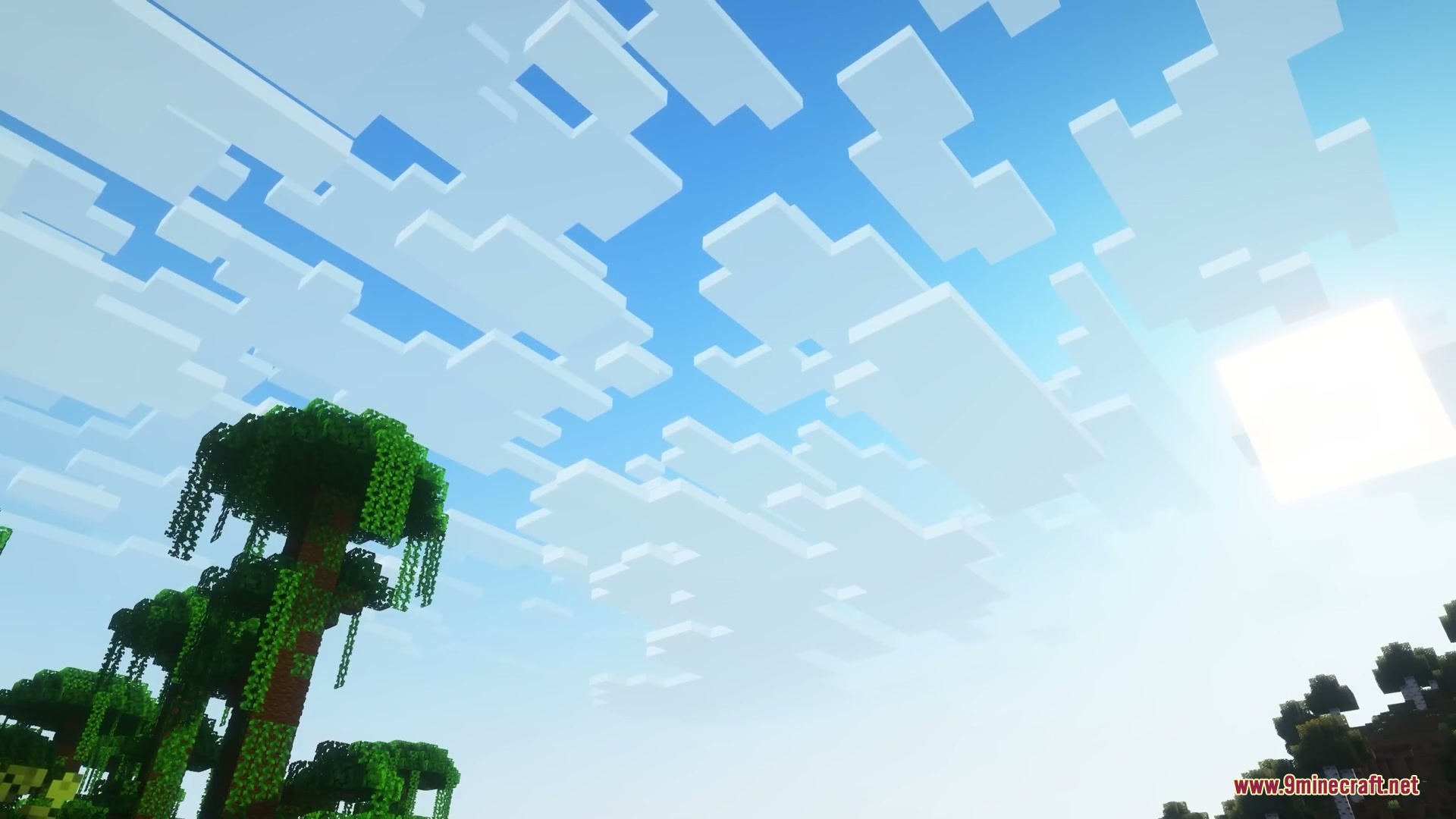 More Cloud Layers Mod Screenshot 1 Multiple layers of blocky clouds fill the sky above a jungle tree