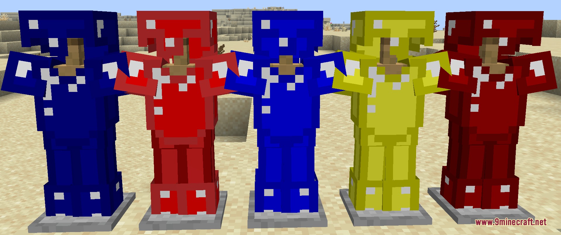 More Oress Mod Screenshot 1 Five armor stands wearing different colored armor sets in a desert biome