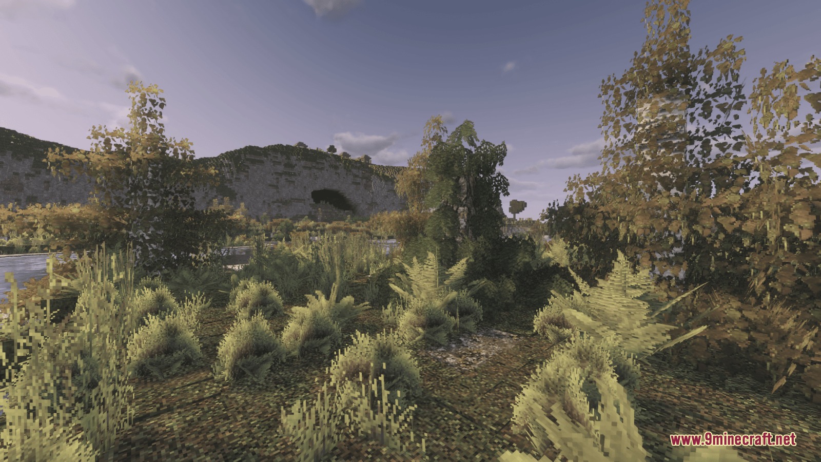 Mostly True Above Resource Pack Screenshot 4 Mostly True Above Resource Pack displays detailed vegetation near a rocky cliff