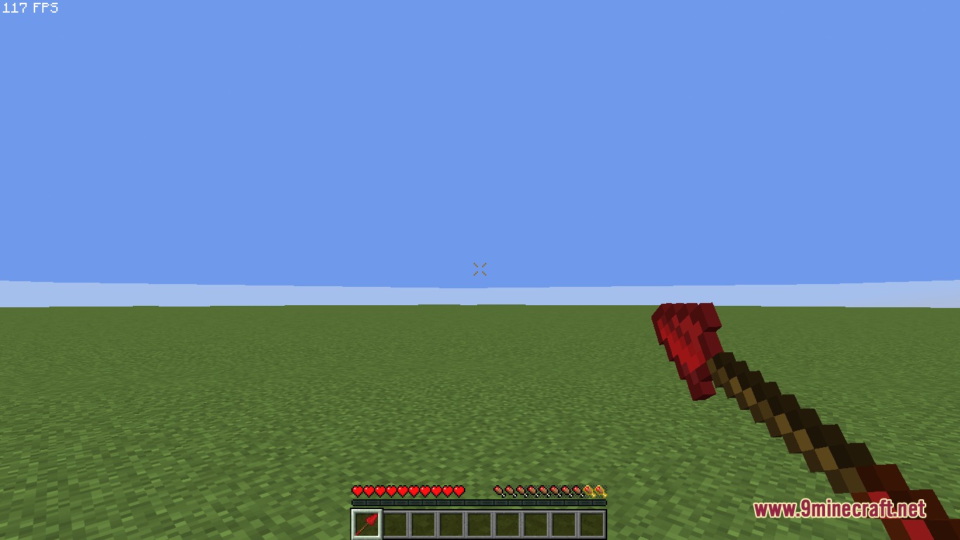 My Gem Mod Screenshot 5 Player holding a red spear in a flat green Minecraft world