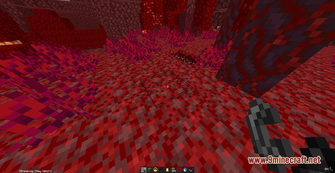 A player holds flint and steel while standing in a crimson forest