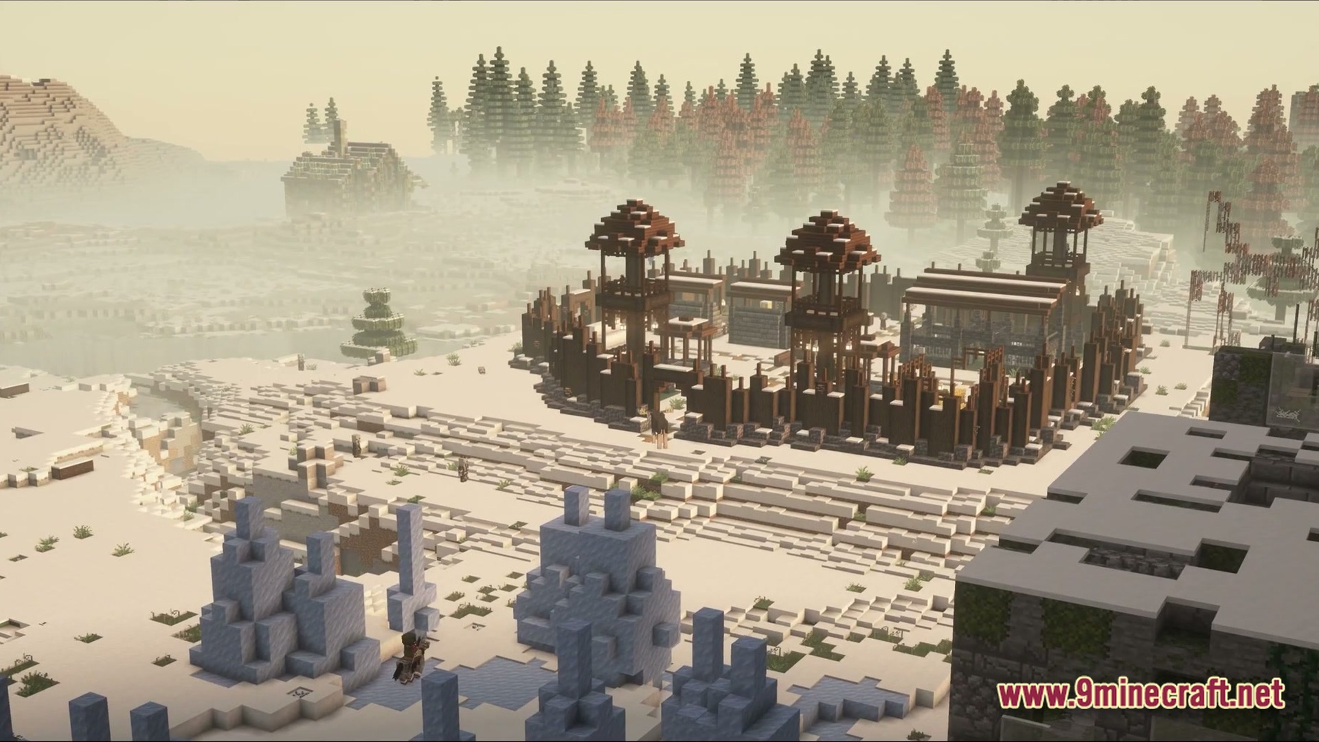 A fortified wooden outpost stands within a snowy tundra biome under a thick, hazy atmosphere