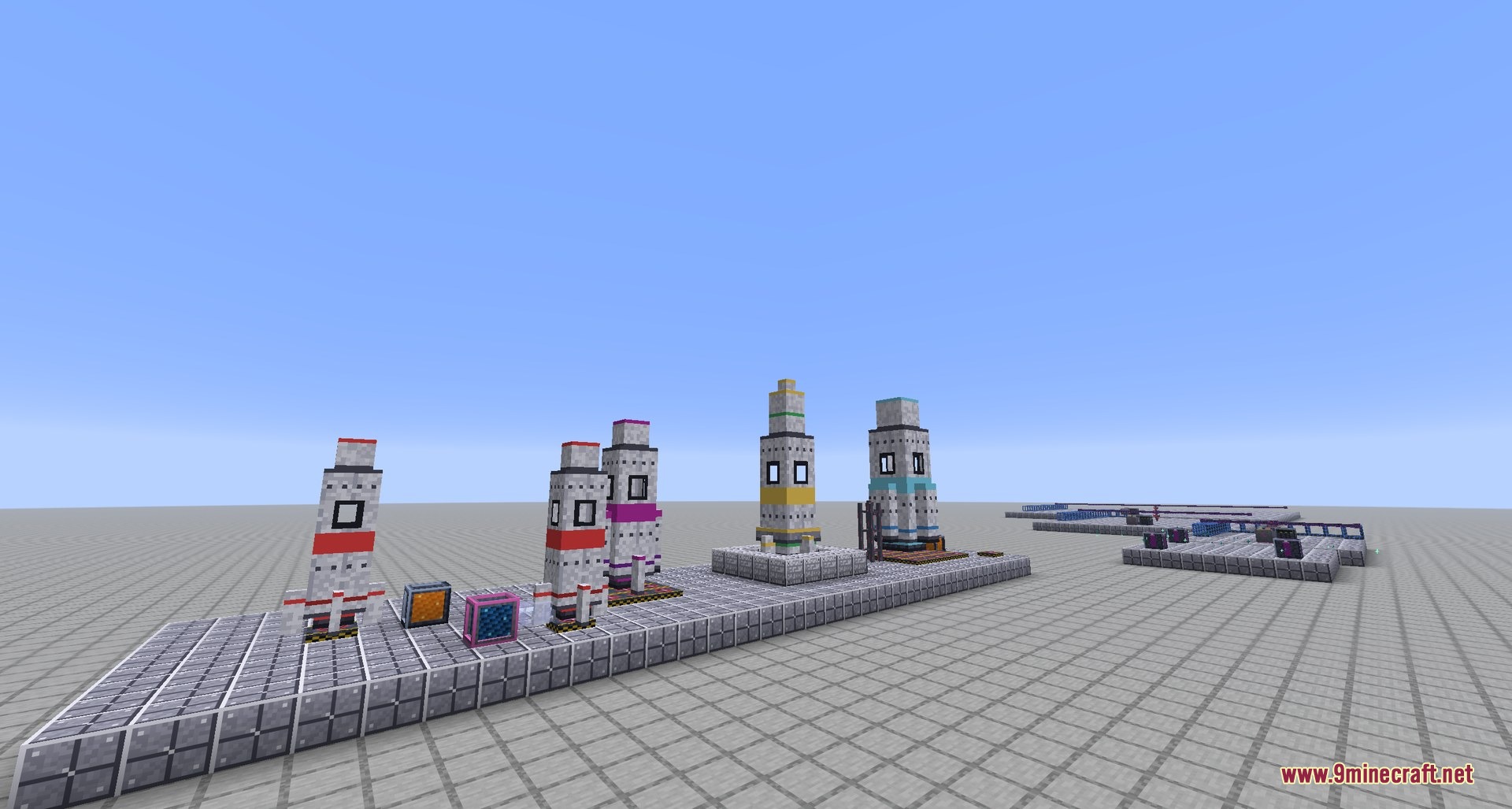 Nerospace Mod Screenshot 2 Several different rocket models displayed on a block platform in Minecraft
