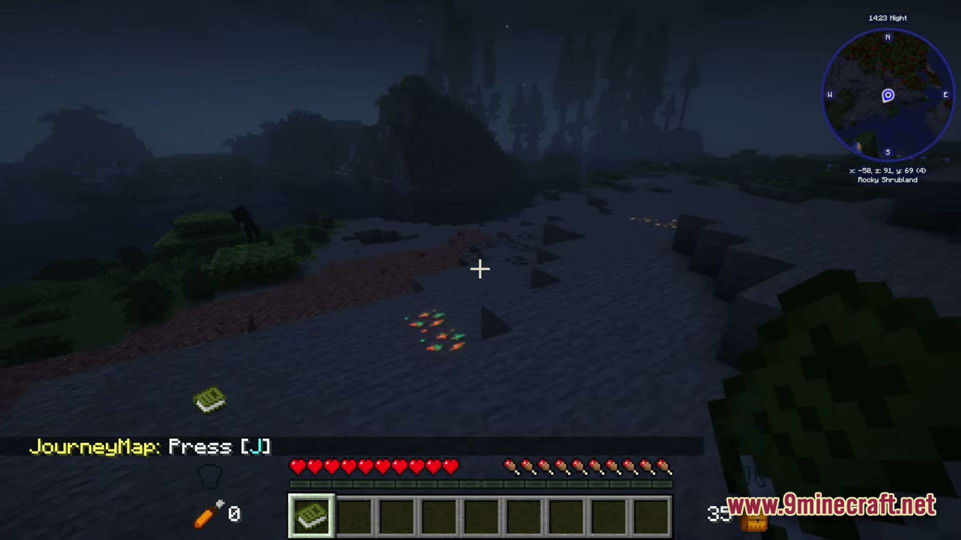 A first-person view of a rocky shrubland biome at night with visible surface ore deposits
