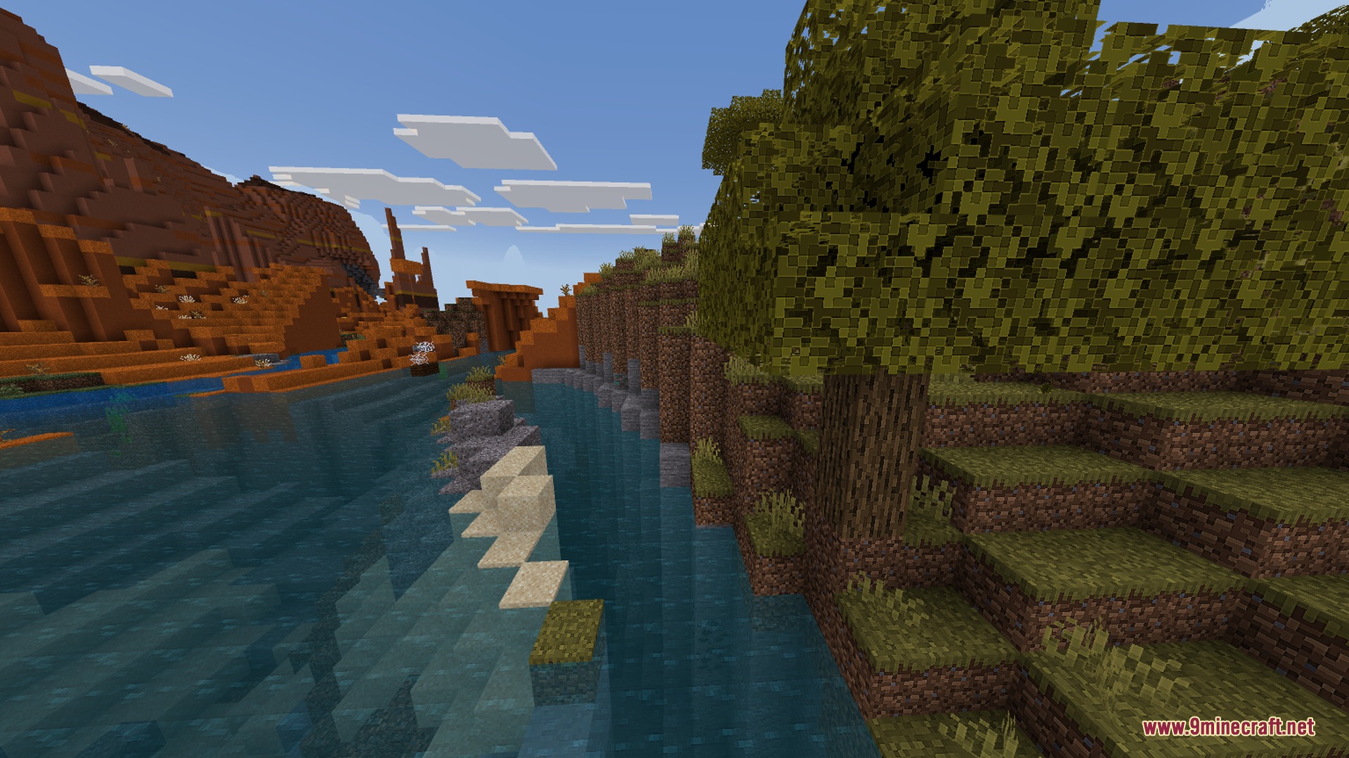 Newb NightfFall Official Shader Screenshot 3 A scenic river flows between a red mesa and a lush forest biome