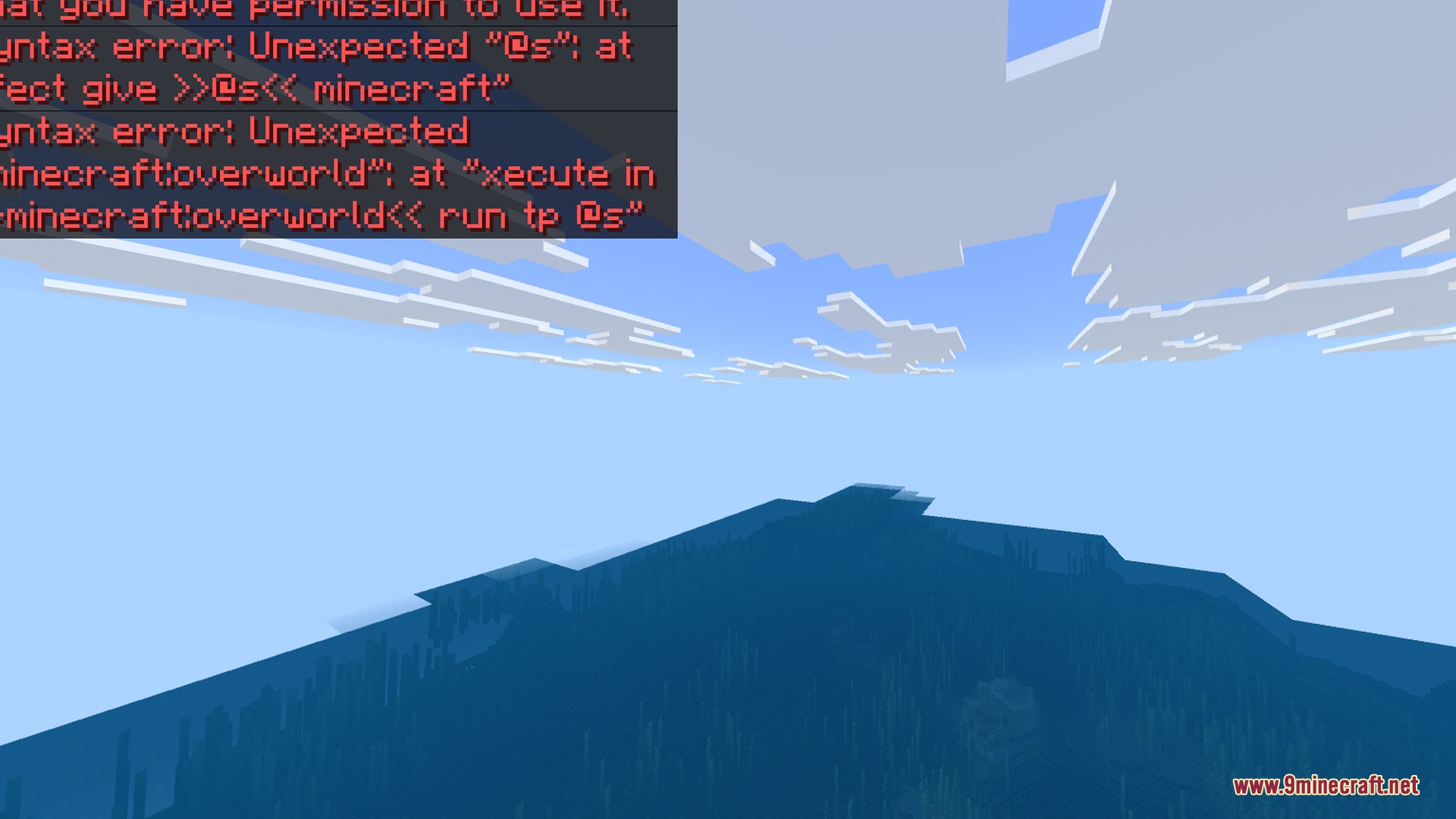 A bright blue sky with white clouds over a vast Minecraft ocean